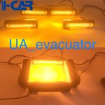 Стробоскоп жовтогарячий у решітку радіатора жовтий евакуатора мигалка